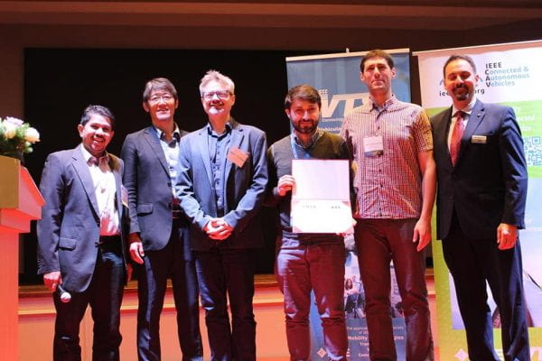 Wyglinski presenting the Best Overall VTC2019-Spring Paper to Andrea Tassi, Ioannis Mavromatis, Robert Piechocki, Andrew Nix of the University of Bristol and Christian Compton, Tracey Poole, Wolfgang Schuster from Atkins Global Limited, for their paper titled “Agile Data Offloading over Novel Fog Computing Infrastructure for CAVs”